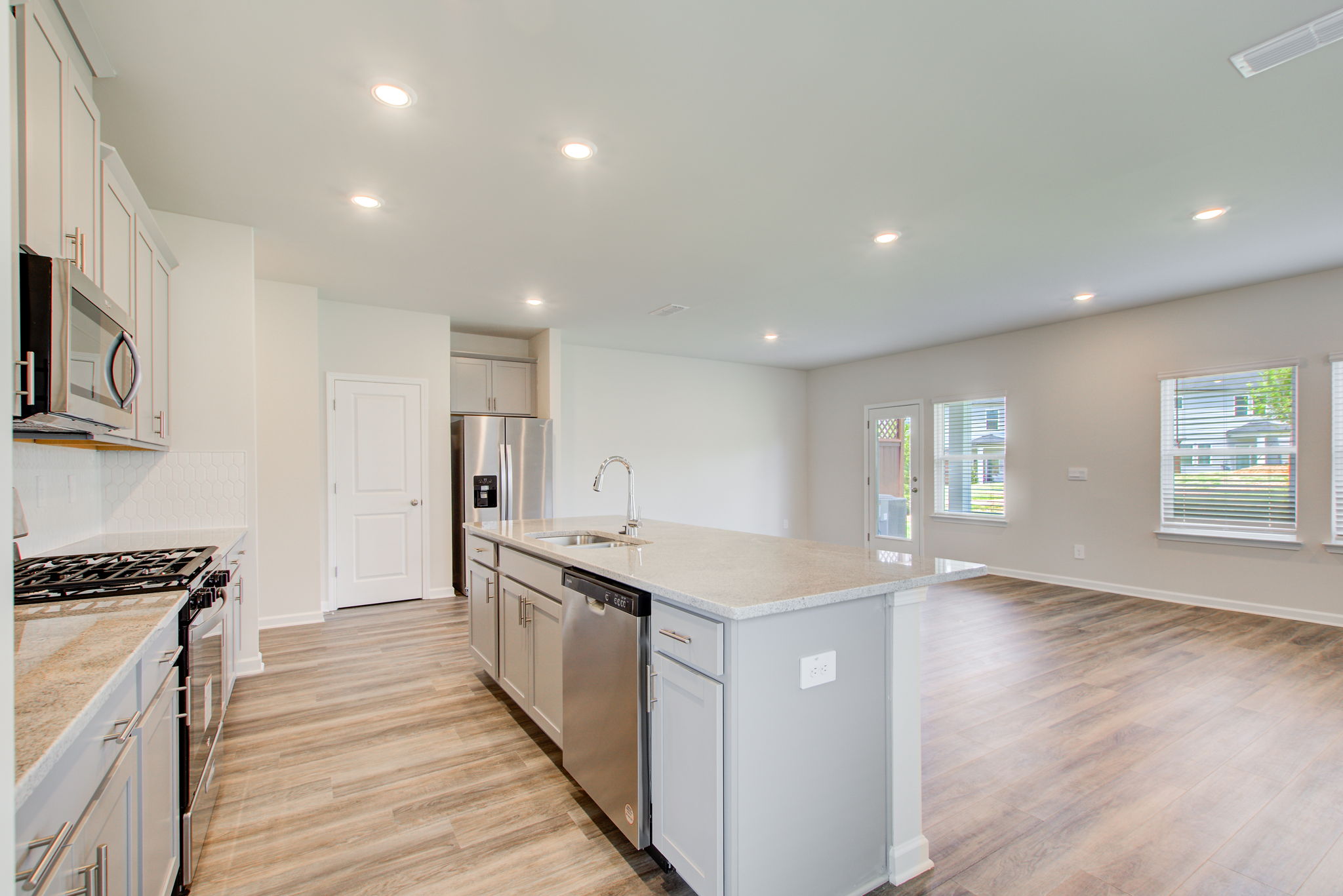8 Kitchen D w Dining + Living