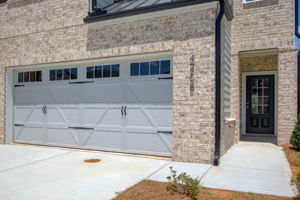 2 Exterior Front Partial Garage + Entry Detail