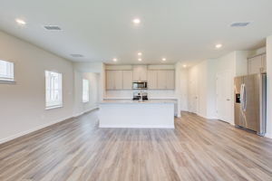 14 Kitchen E w Foyer + Garage Access