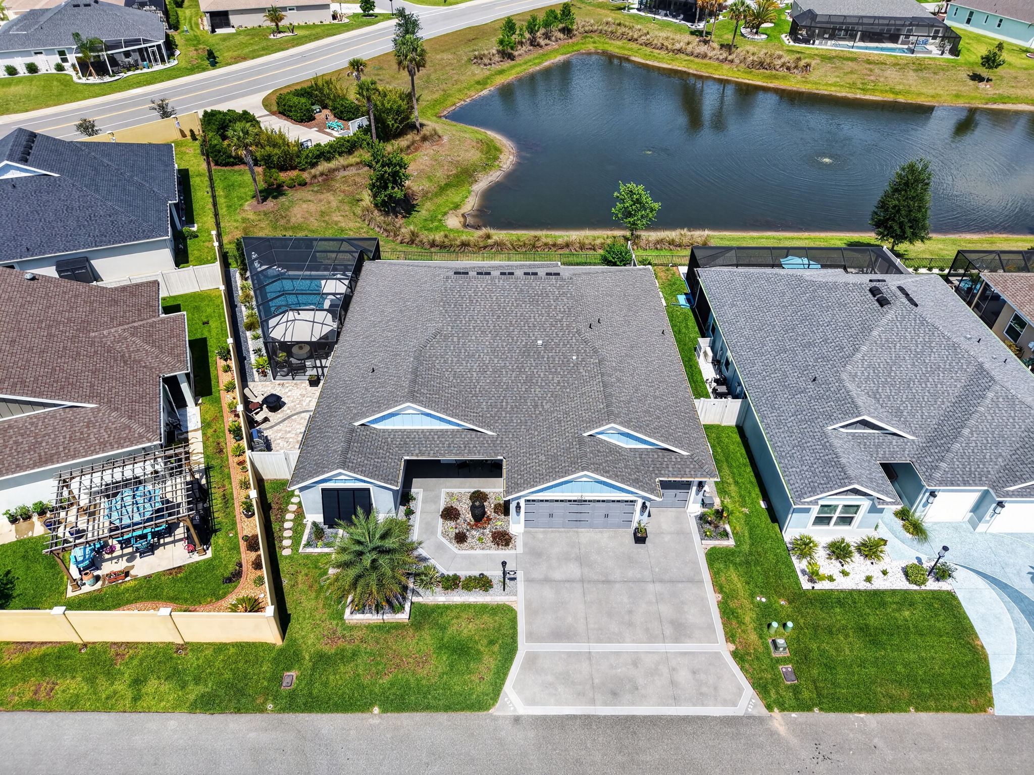 Aerial Front Elevation with Swimming Pool and Water Views
