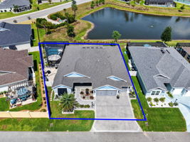 Aerial Front Elevation with Property Lines, Swimming Pool, and Water Views
