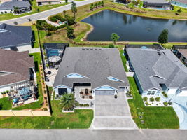 Aerial Front Elevation with Swimming Pool and Water Views