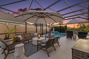 Twilight Swimming Pool and Screen Porch with PRIVACY Wall and Landscaping