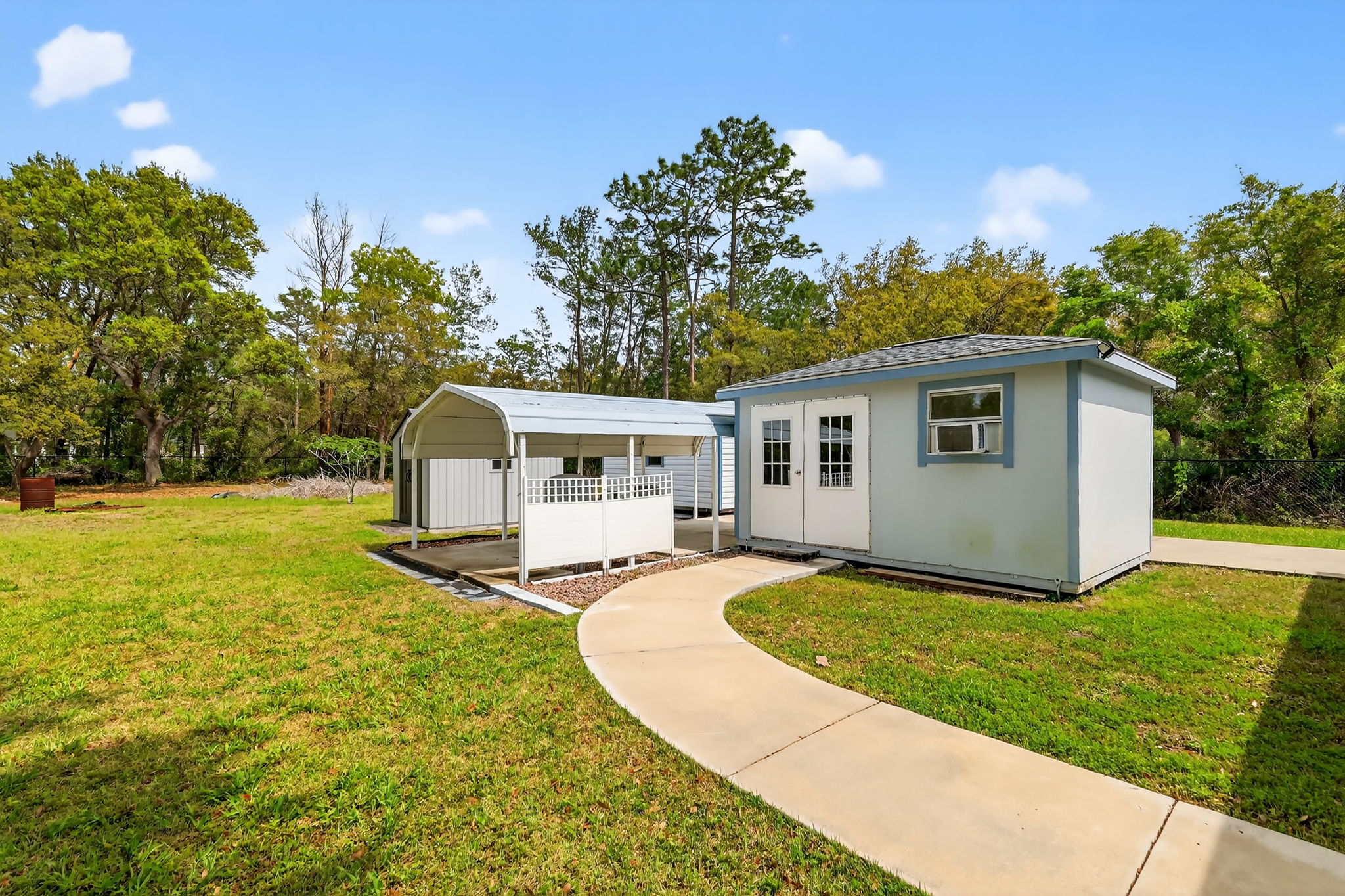 Air Conditioned Shed with Carport