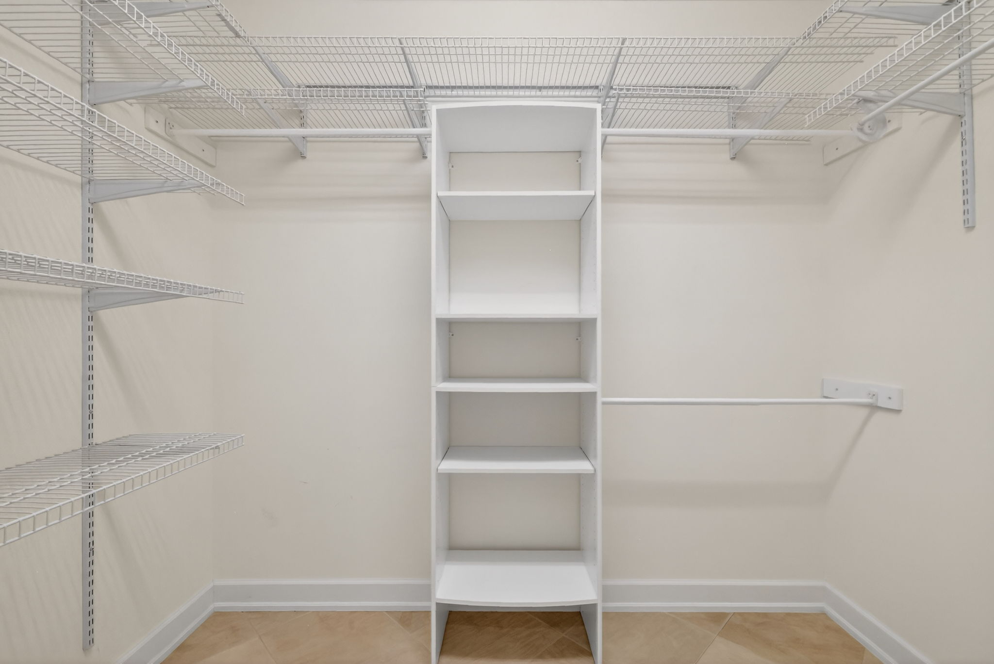 Primary Bedroom Second Custom Walk-In Closet