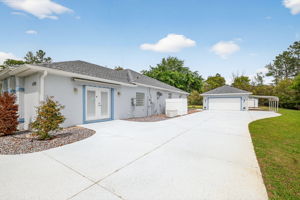 Side Elevation with Garage and Carport