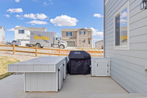 Built-in patio table and storage area, perfect for BBQs and entertaining!