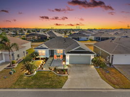 Twilight Aerial Front Elevation with Rear Walking and Biking Trails