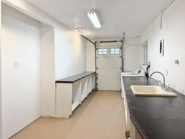 Smaller garage bay/laundry area