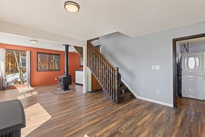 Open floor plan leading you from living room to dining room to kitchen