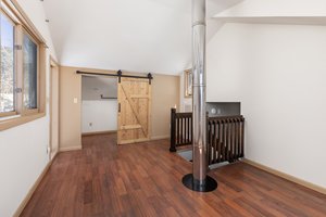 Primary bedroom walk in closet