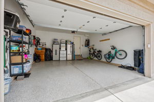 Attached two-car garage, dry walled, epoxy floor