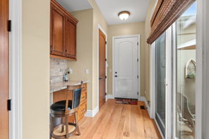 Built-in desk area, extends to outdoor patio and 2 car attached garage