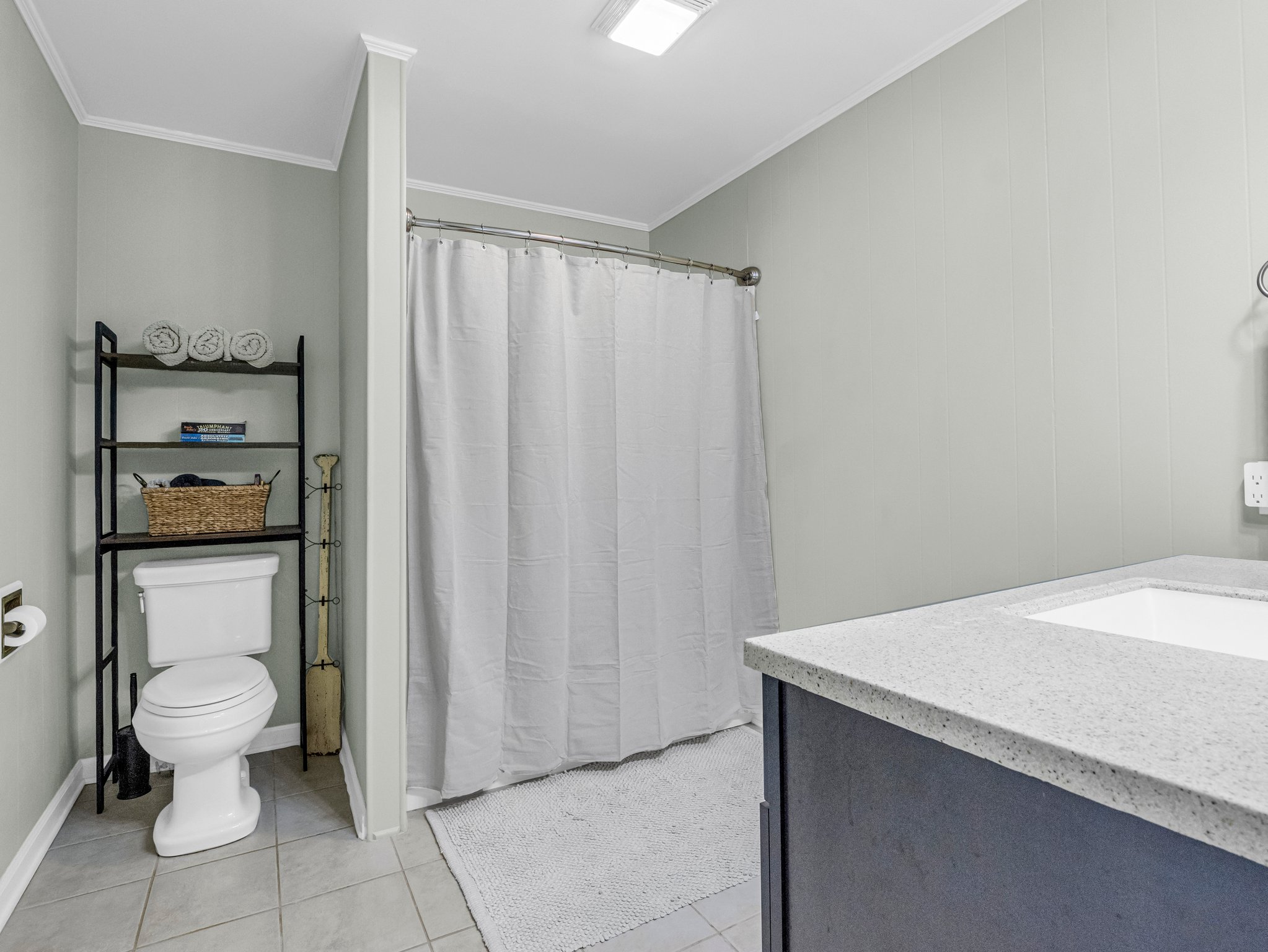 Guest bath in the lower-level finished basement.