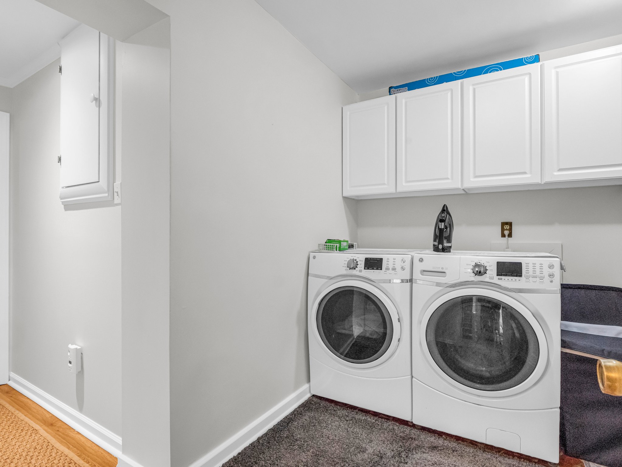 Laundry room in the lower-level finished basement.