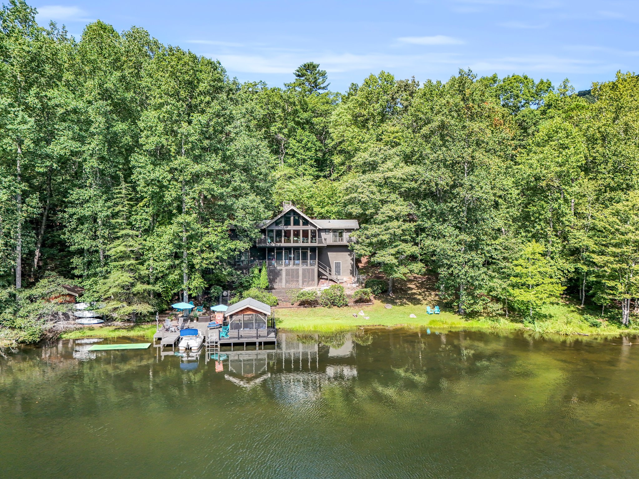 Peaceful setting on a double lot on Bald Mountain Lake, allowing non-motorized boating.