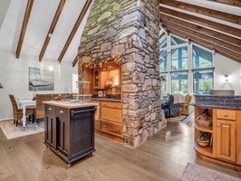 Kitchen and dining areas are open to the living room.