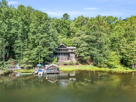 Peaceful setting on a double lot on Bald Mountain Lake, allowing non-motorized boating.