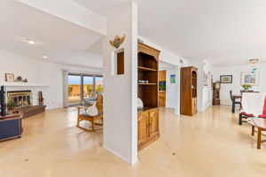 View from foyer to family room and living room