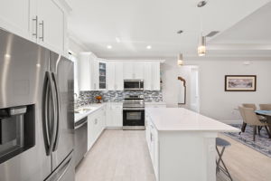 Bright and modern kitchen with island.