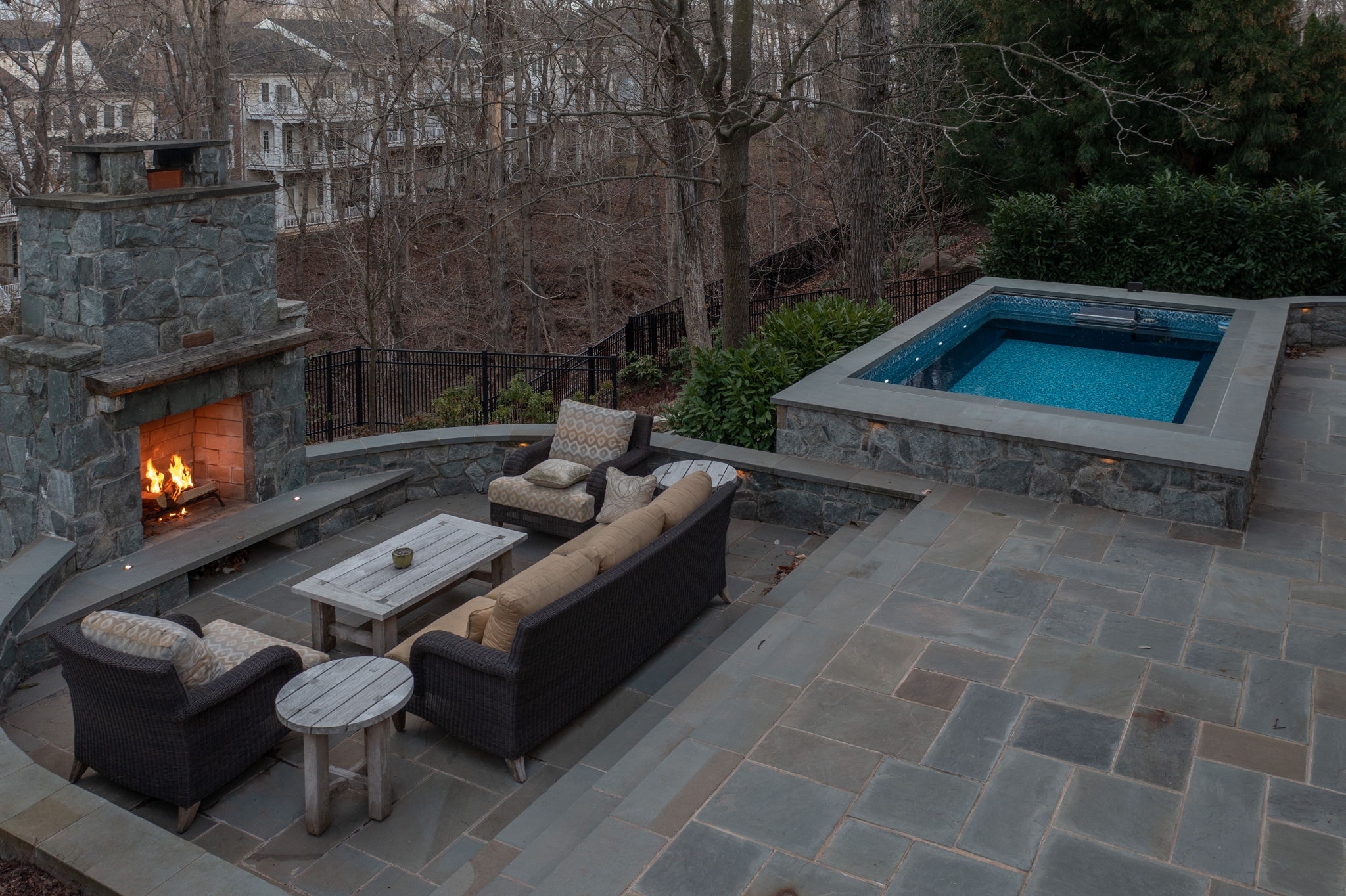 Buit in outdoor fireplace and lounge area