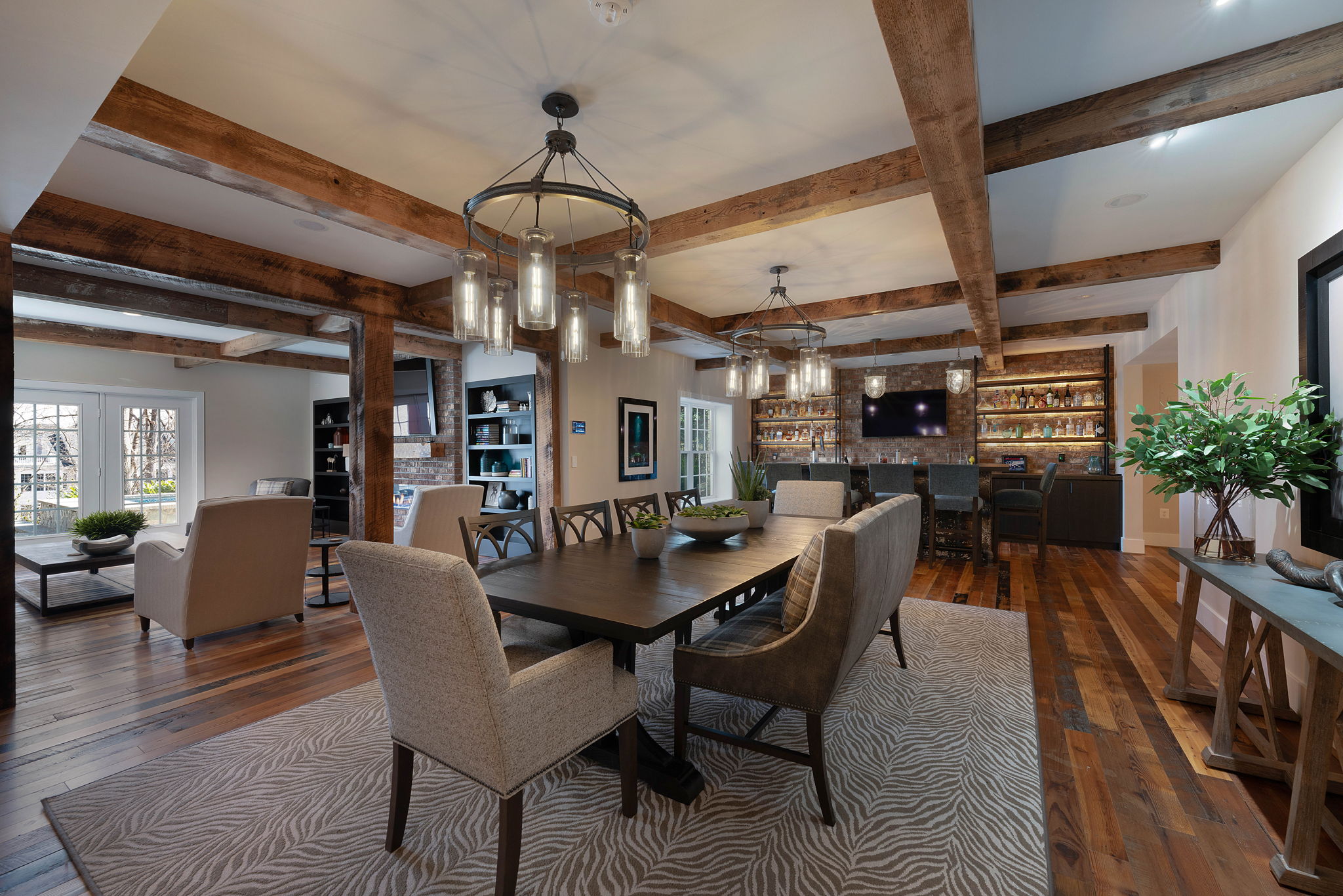Totally stunning remodeled lower level with reclaimed oak beams accenting the ceiling