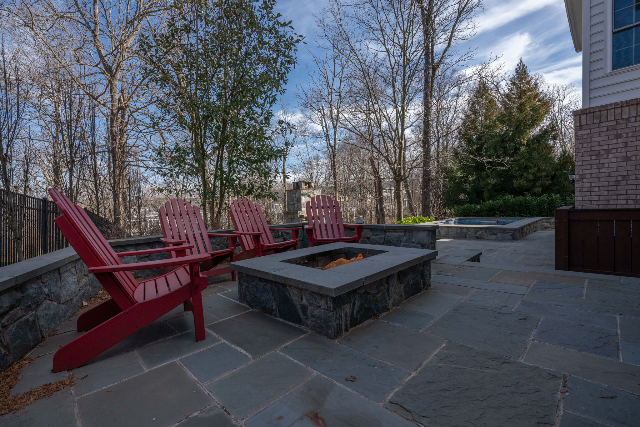 Terrace with firepit and outdoor TV
