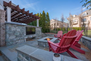 Terrace with firepit and outdoor Sunbrite TV