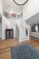 The two-story foyer is spacious and welcoming