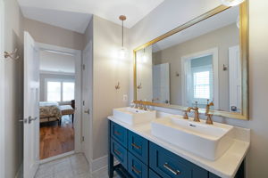 A updated bathroom that two bedrooms have access to.