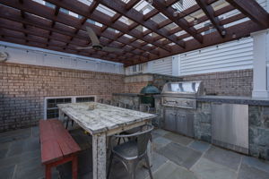 Outdoor kitchen with overhead pergola