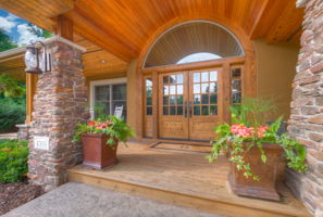 Impressive curb appeal: large front porch welcomes you inside