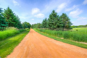 Set back from the road with a long driveway for ultimate privacy