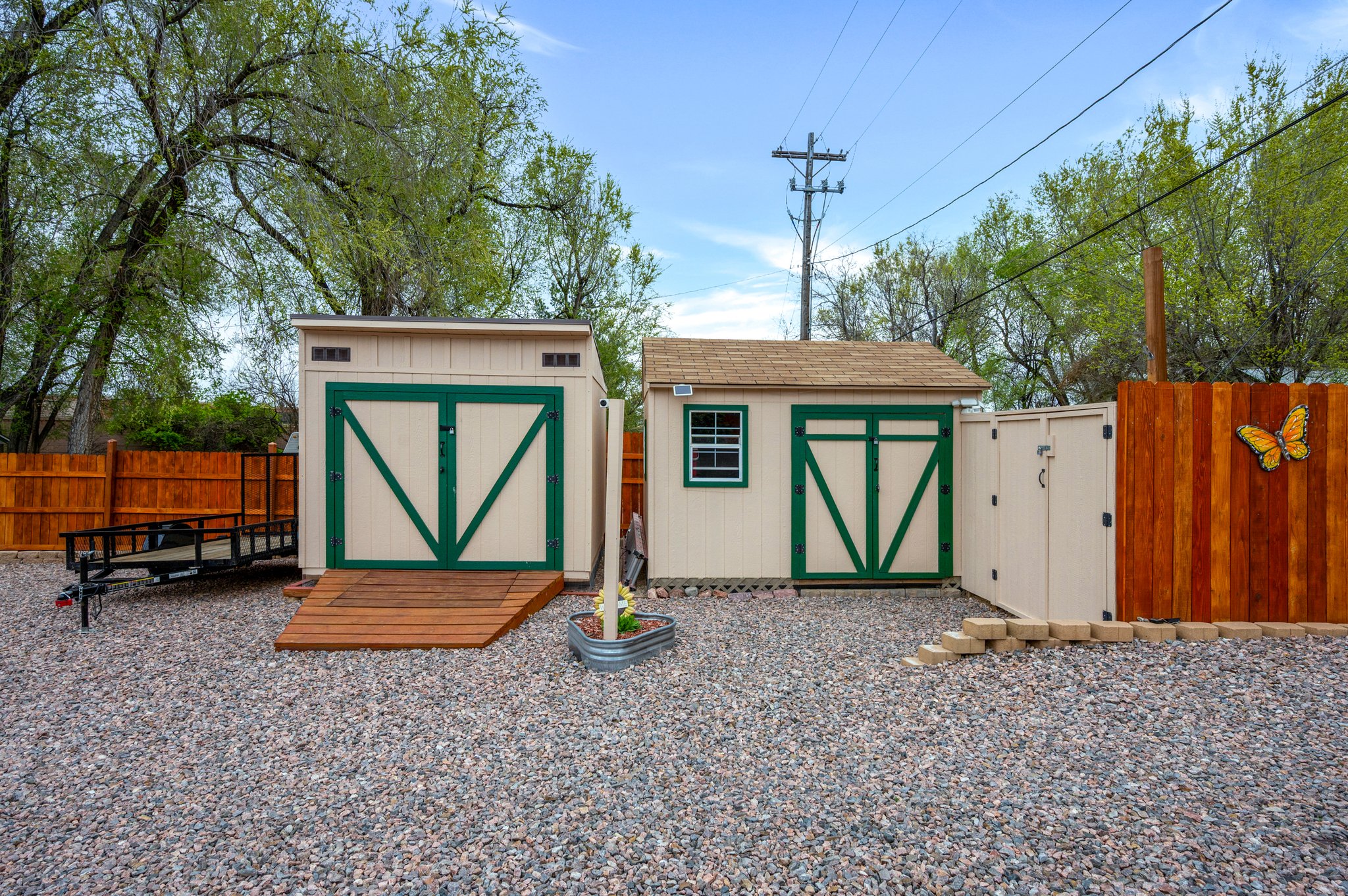2 storage shed with wood floors plus 3rd lockable space