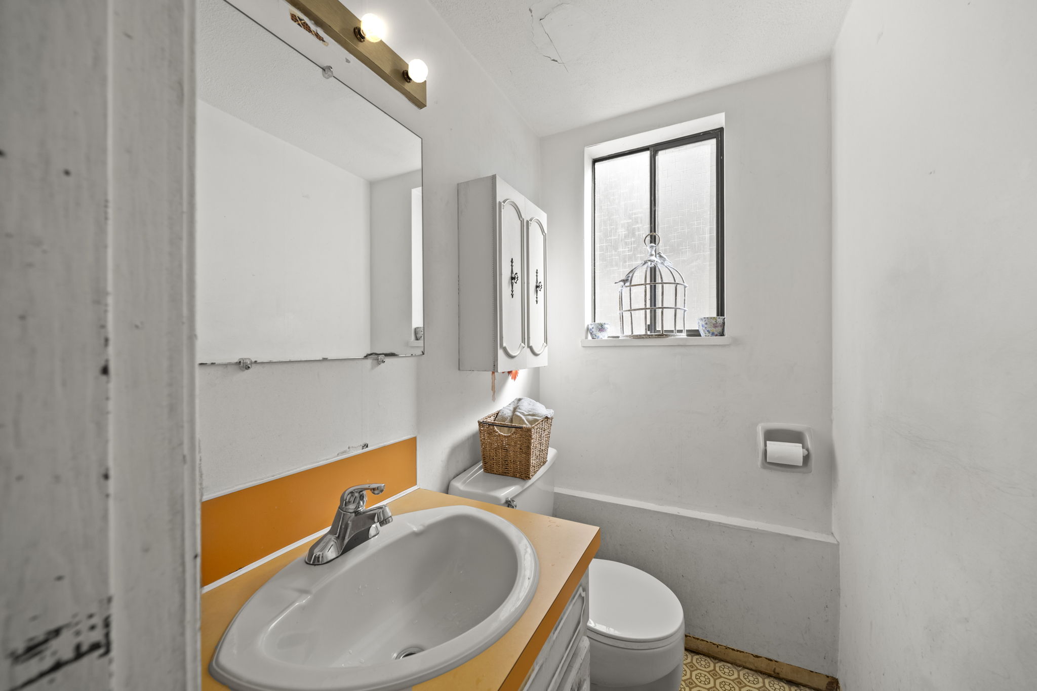 2 piece bathroom located on lower level