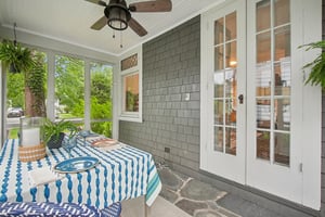 The screened Porch off the living room! Where summer breezes and morning coffee meet. This porch is your front row seat to Montclair’s most peaceful moments.