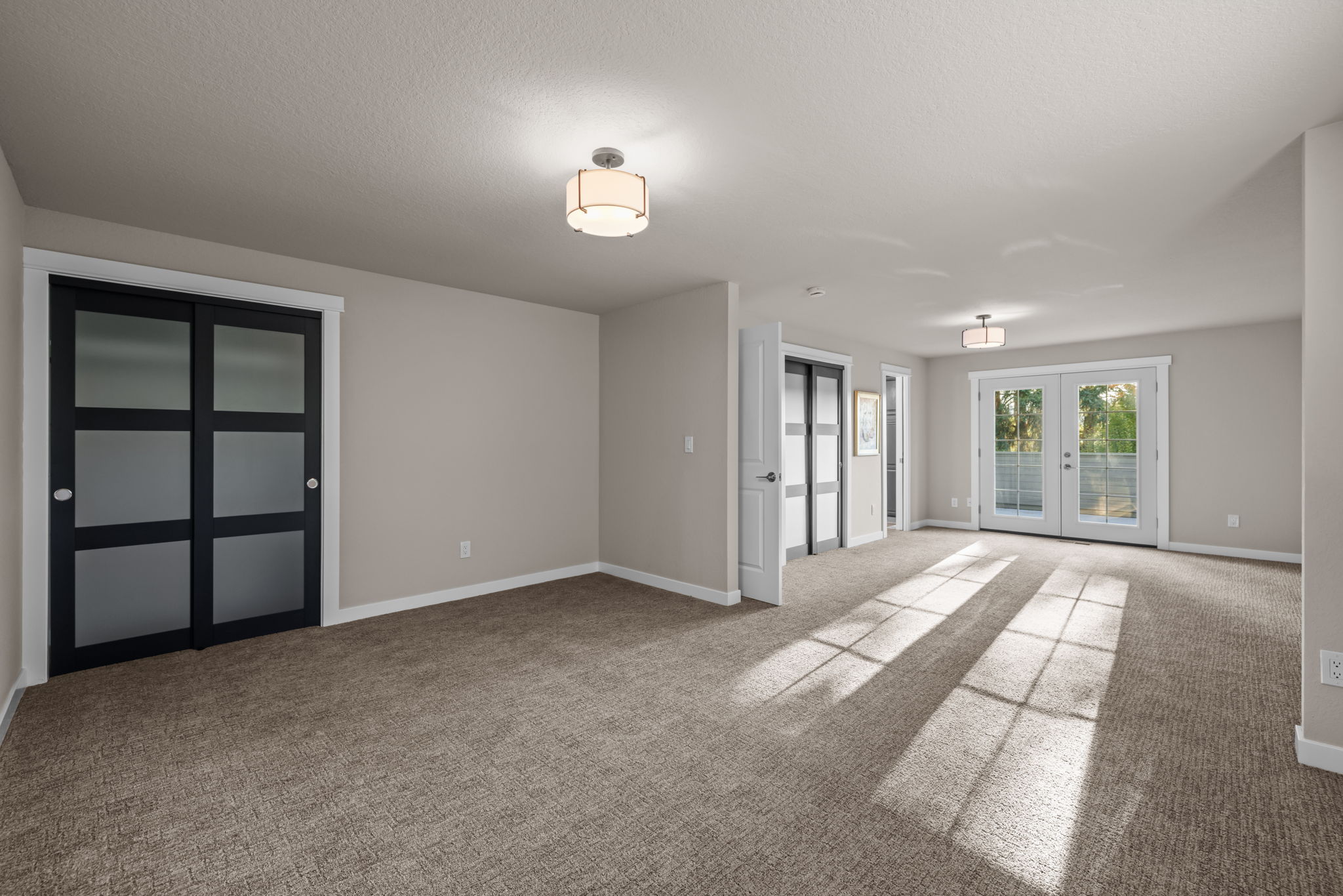 Primary Bedroom - with sitting area by french doors