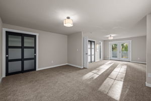 Primary Bedroom - with sitting area by french doors