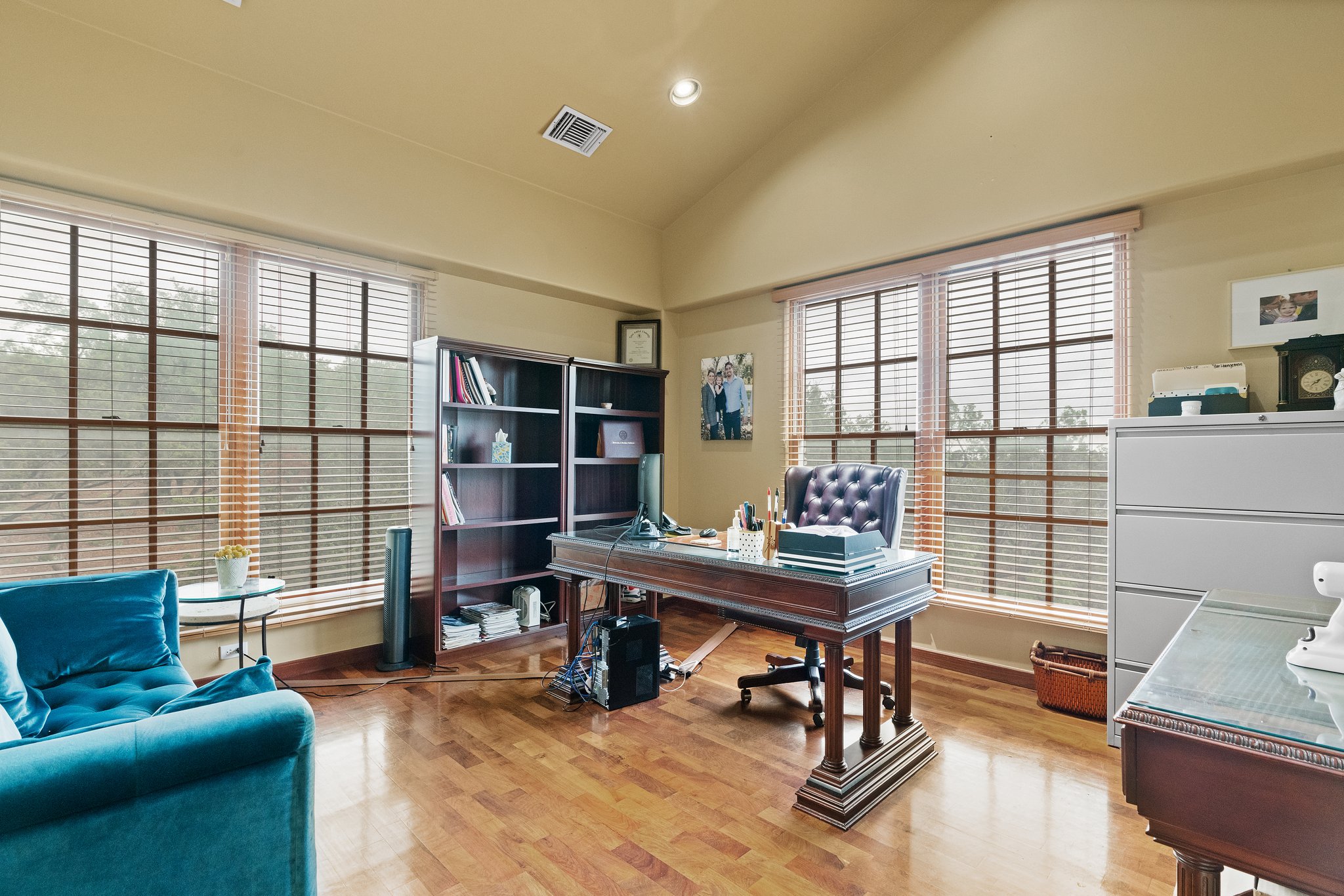 Spacious executive office with ample light and greenbelt views