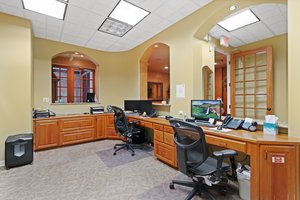 Central office with built-in desks, sheles, and cabinets