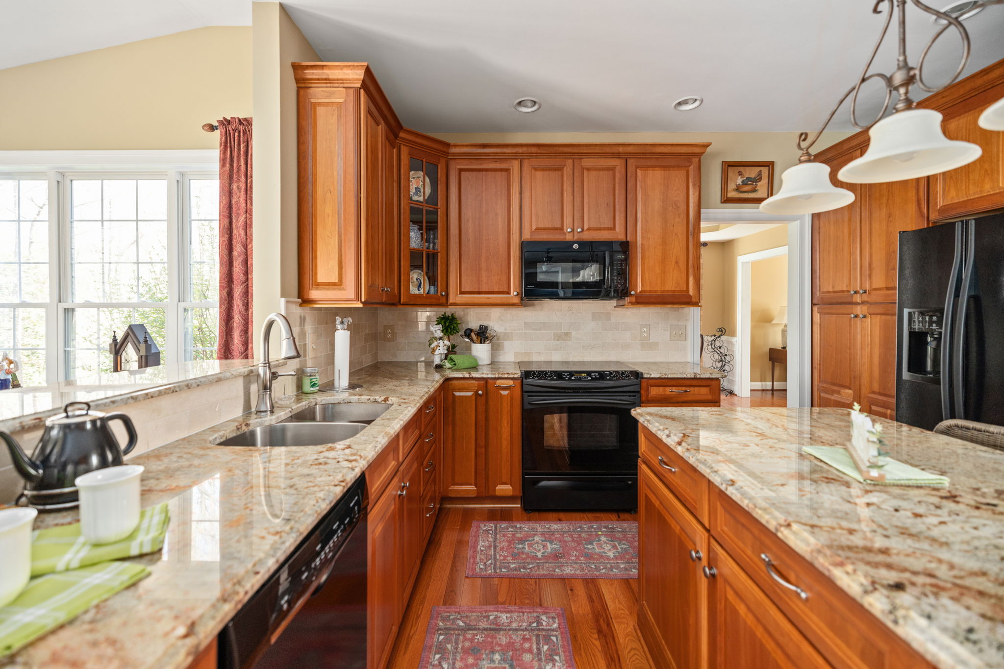 Warm cherry cabinetry