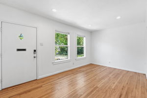 Original wood floors, updated windows, vintage doors.