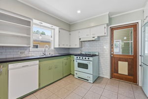 Kitchen door leads to the screened back porch.