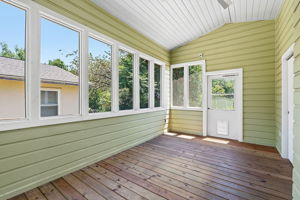 Screened porch added.