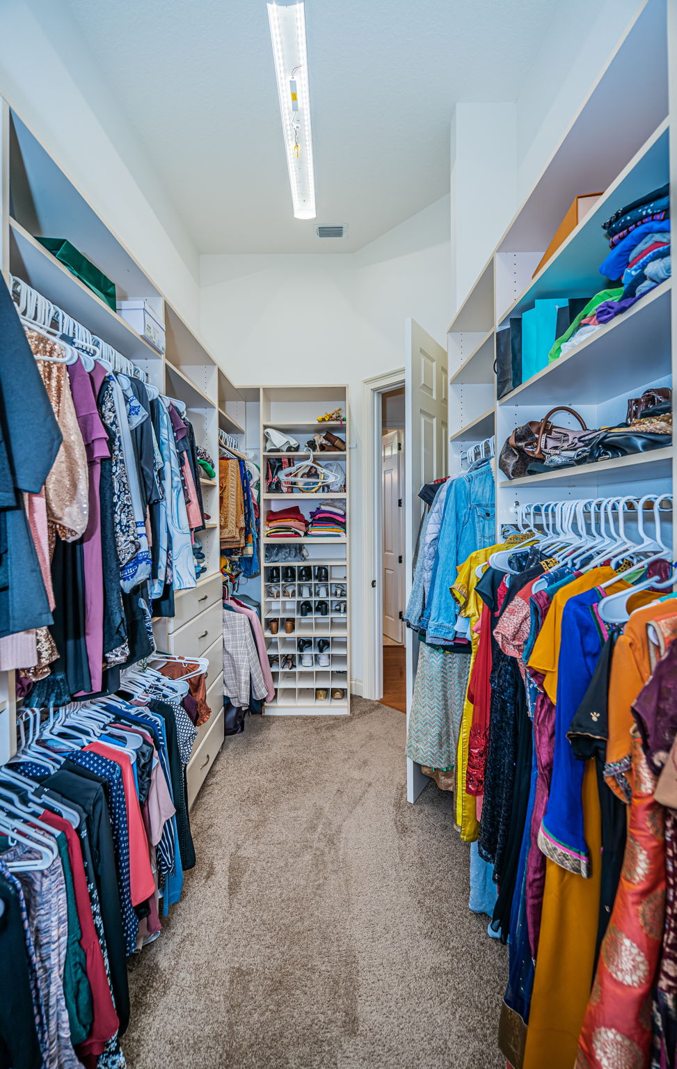 First Floor Master Bedroom Walk-in Closet1b