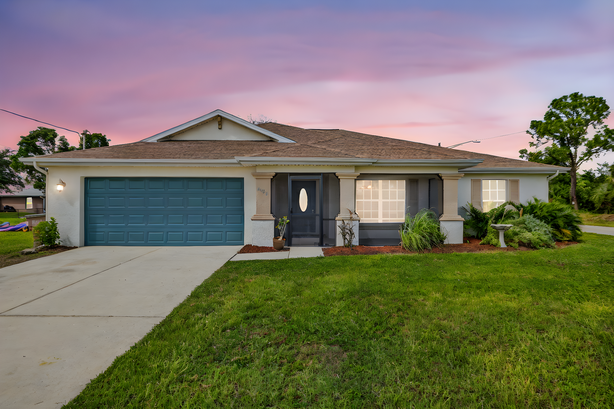 Front Exterior 2 of 2 day to dusk.jpeg