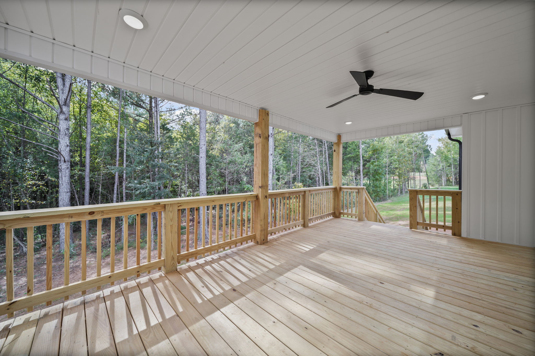 Large covered patio with recessed lighting and ceiling fans