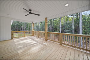 Large covered patio overlooking your private wooded back yard
