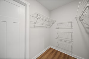 Primary closet w/ solid wire rack shelving