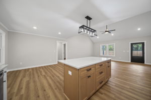 Large quartz top island in kitchen